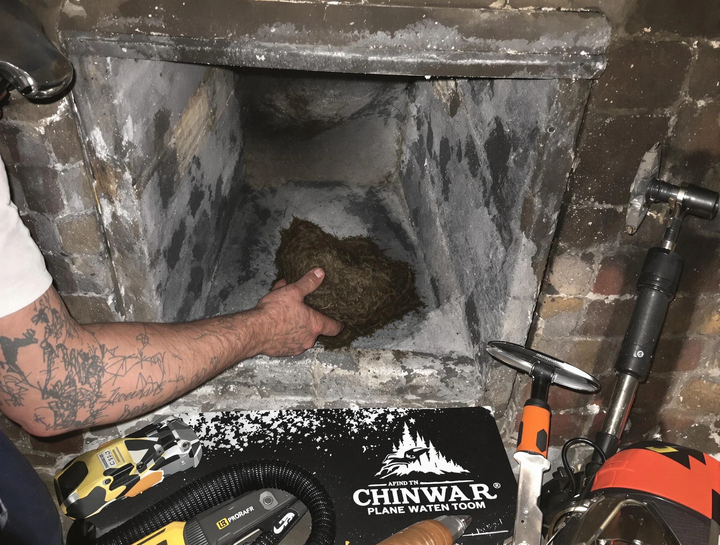Coopertown Chimney Sweep safely removing debris and screening chimney in Coopertown, TN